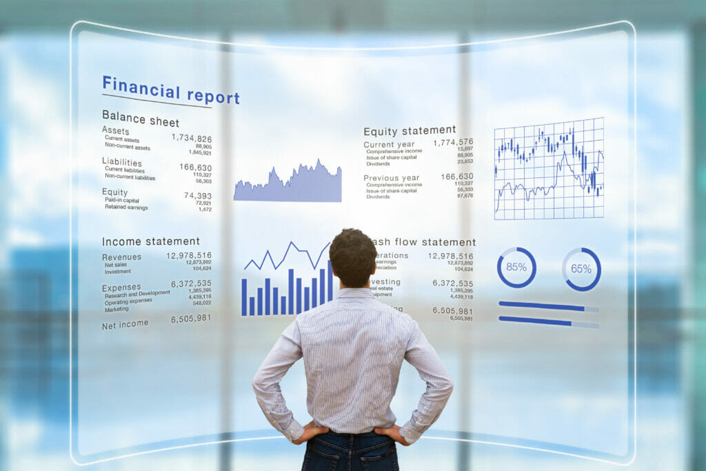 Accountant standing in front of an analytical financial report